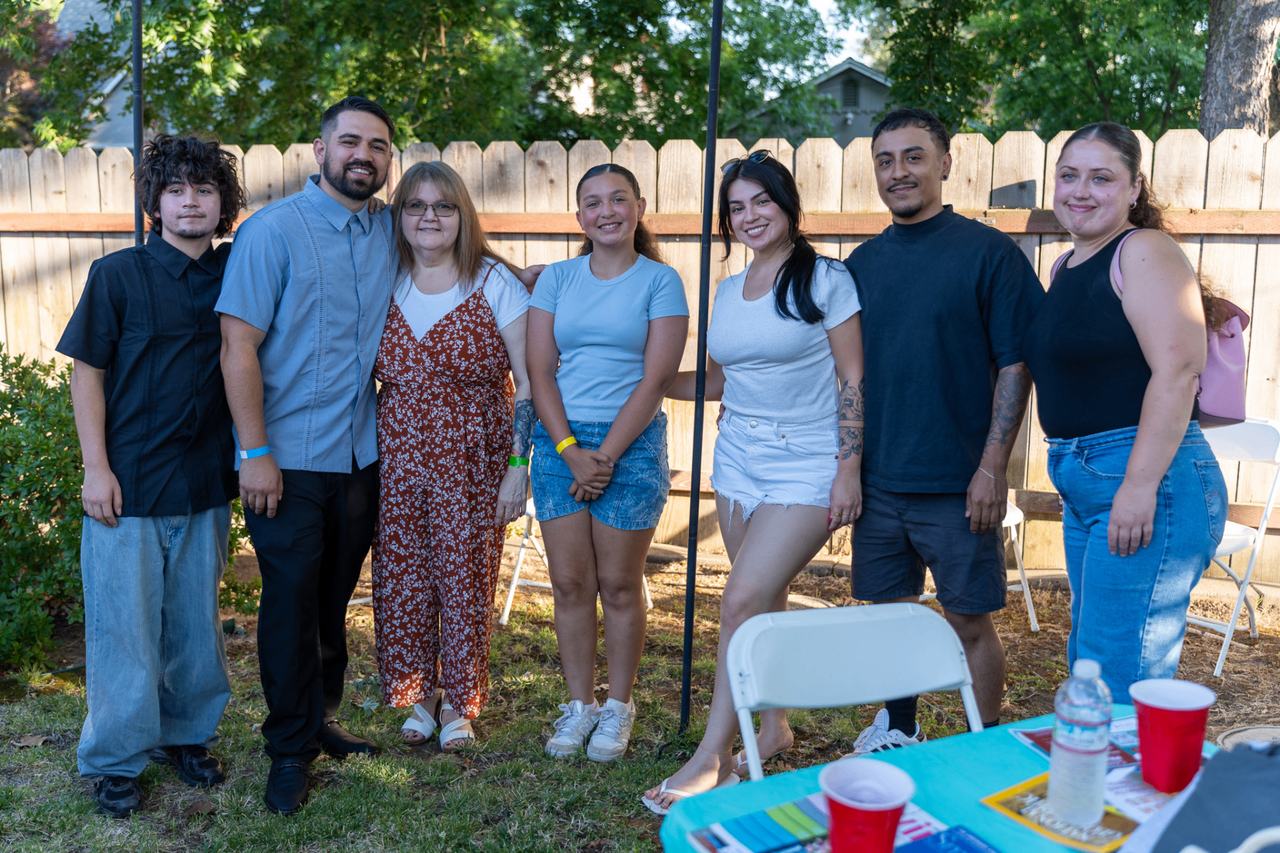 Juan Telles with family and community