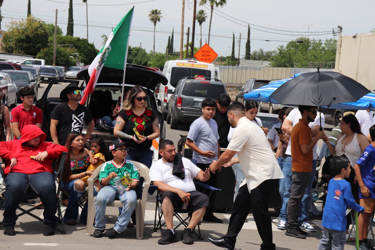 Juan Telles talking with Modesto residents