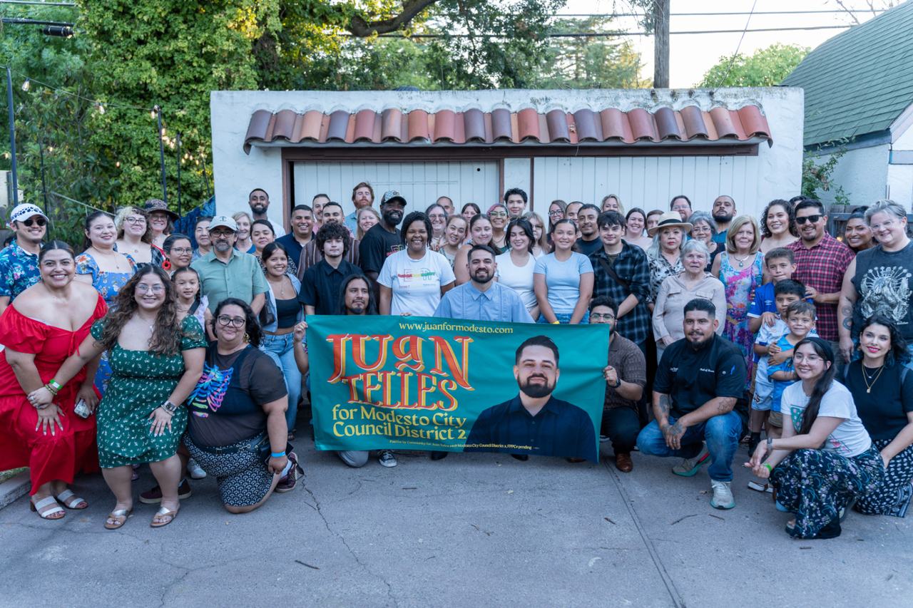 Juan Telles with community supporters